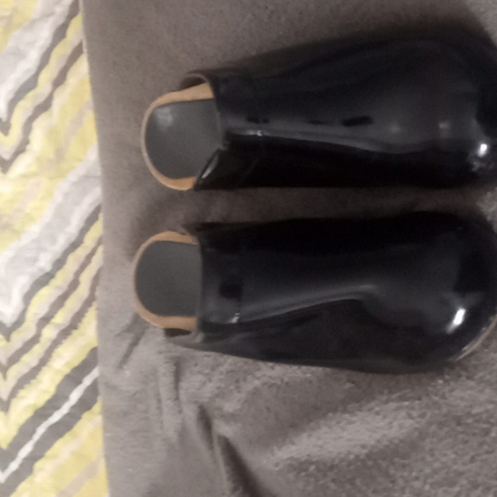 Black Sanita patent leather size 10 open back clogs.